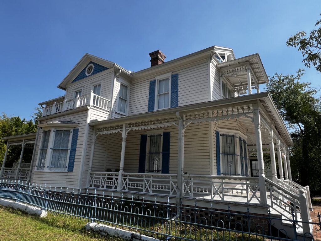 The Artist Cottage exterior with its wraparound porch